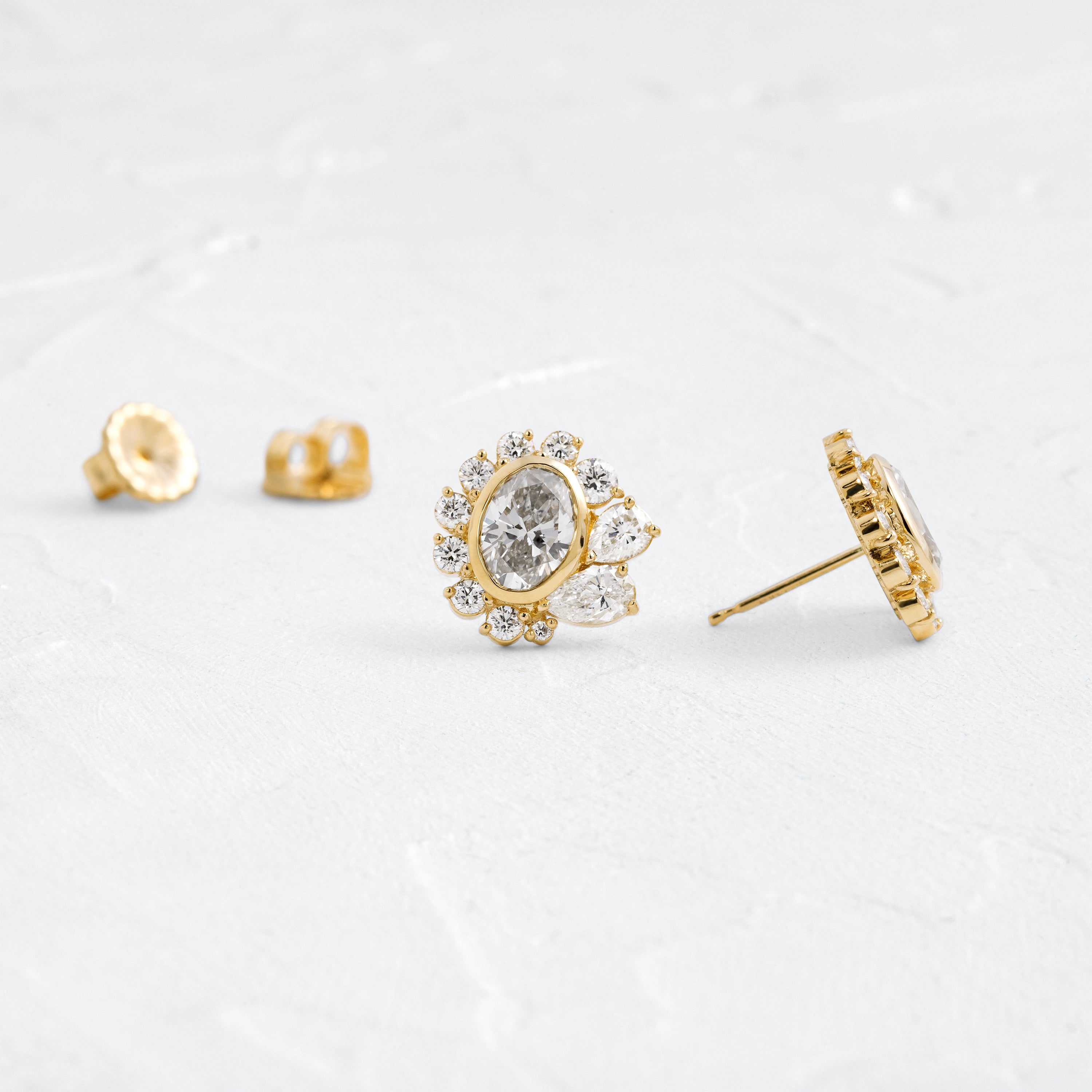 Embroidery Bezel Studs, Oval Cut | Earrings from Melanie Casey