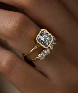 Photo features the Avenue Engagement Ring in Radiant Cut on a model's hand.