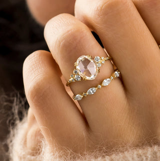 Photo showcases a model wearing the Snowdrift Ring in Rose Cut.