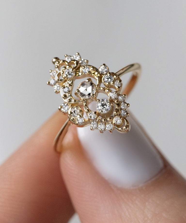 Photo features a model holding the Drawing Room Ring