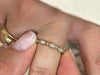 Zoom in on Video of 14k Yellow Gold Oval-cut diamond Snowdrift Engagement Ring with wedding bands worn on hand