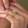 Zoom in on 14k Yellow Gold 1.5ct. Princess-cut Solitaire Diamond Threaded Engagement Ring worn on model with Interwoven Band
