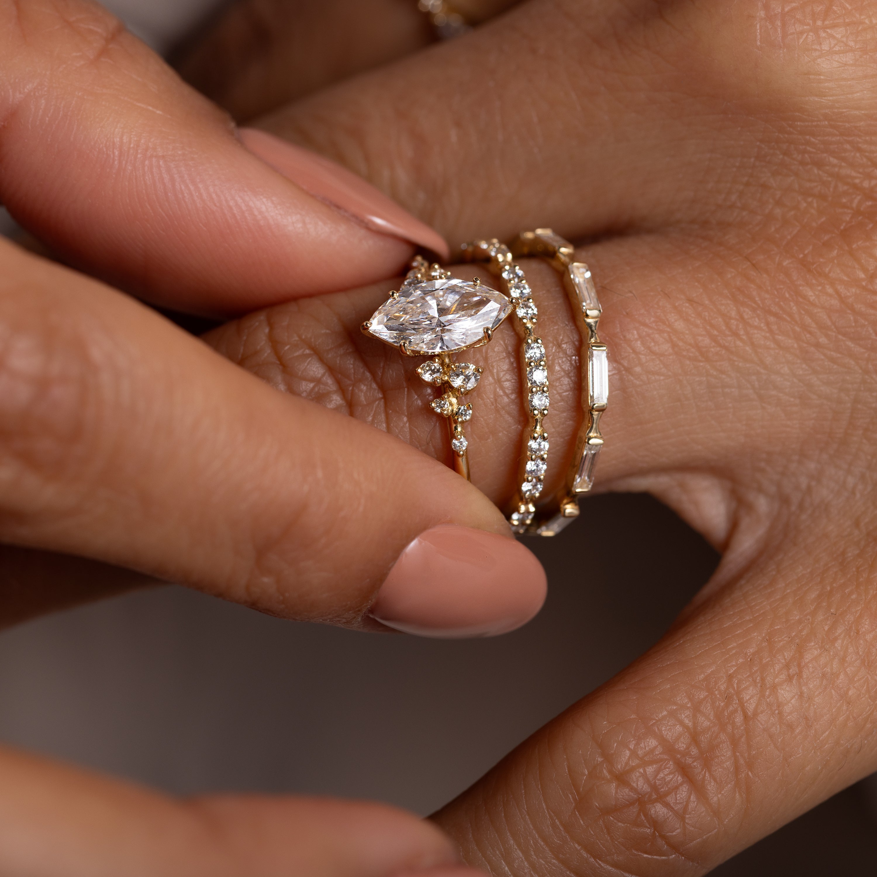 Snowdrift Ring with a Marquise Cut Diamond and Cluster Band