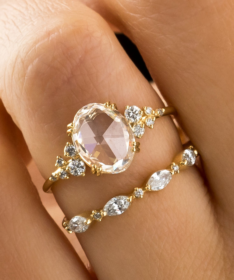 Photos feature model wearing a Snowdrift Ring in Rose Cut