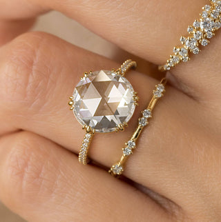 Photo showcases a mode wearing the Moonlit Ring, Rose Cut.