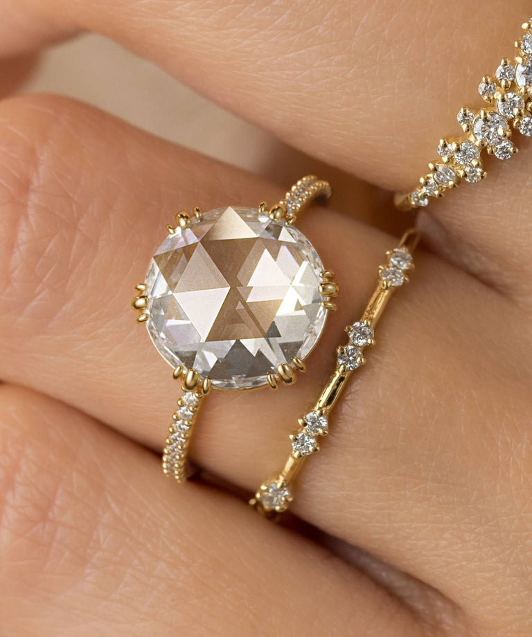 Photo features a model wearing the Moonlit Ring Rose Cut
