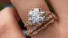 Zoom in on Video of 14k Yellow Gold 3ct. Round-cut diamond Snowdrift Engagement Ring with accent diamonds worn on model 